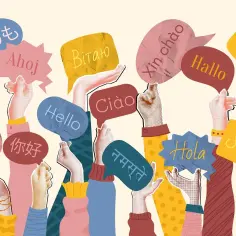 Wiele rąk trzyma chmurki z napisami "Witaj", "你好", "Hello", "Ciao", "Xin chào", "Hallo", "안녕하세요", "नमस्ते", "Hola", "Salut". Znikła bariera językowa!